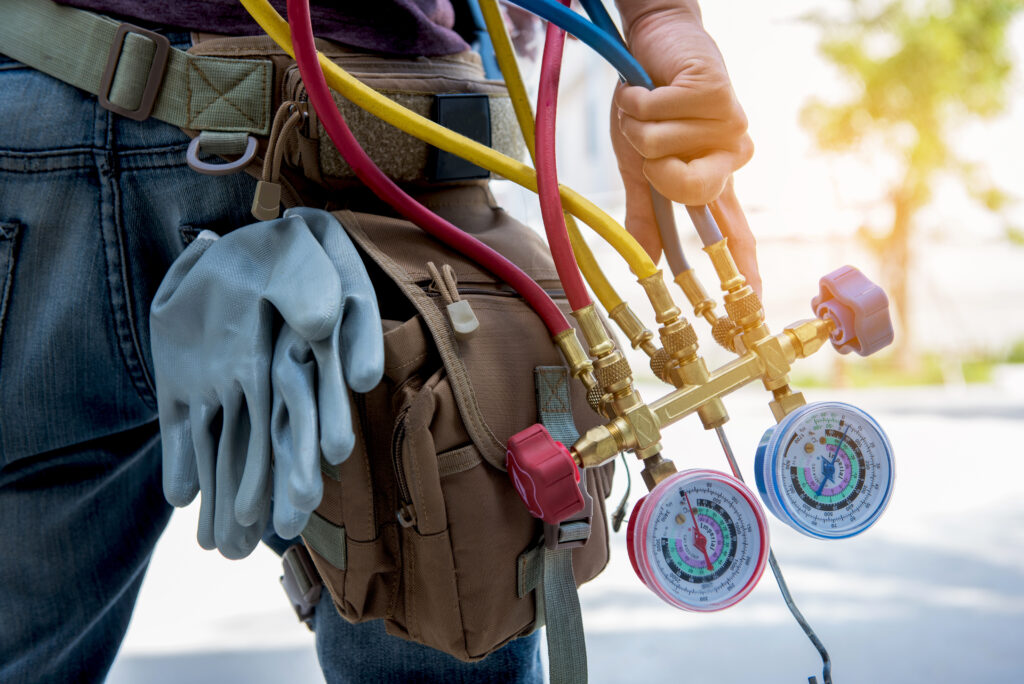 Servicing Air Conditioner With Pressure Gauge