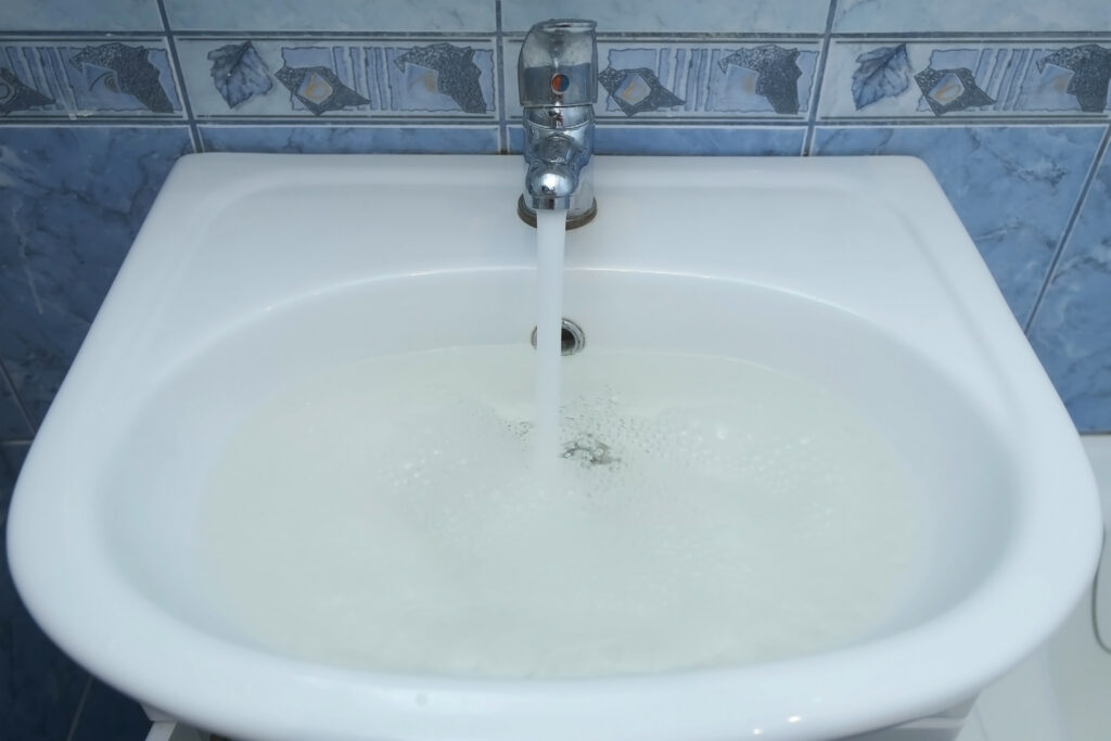 Clogged sink drain causing house to smell like sewage