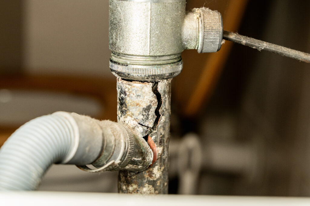 Cracked drain pipe causing house to smell like sewage
