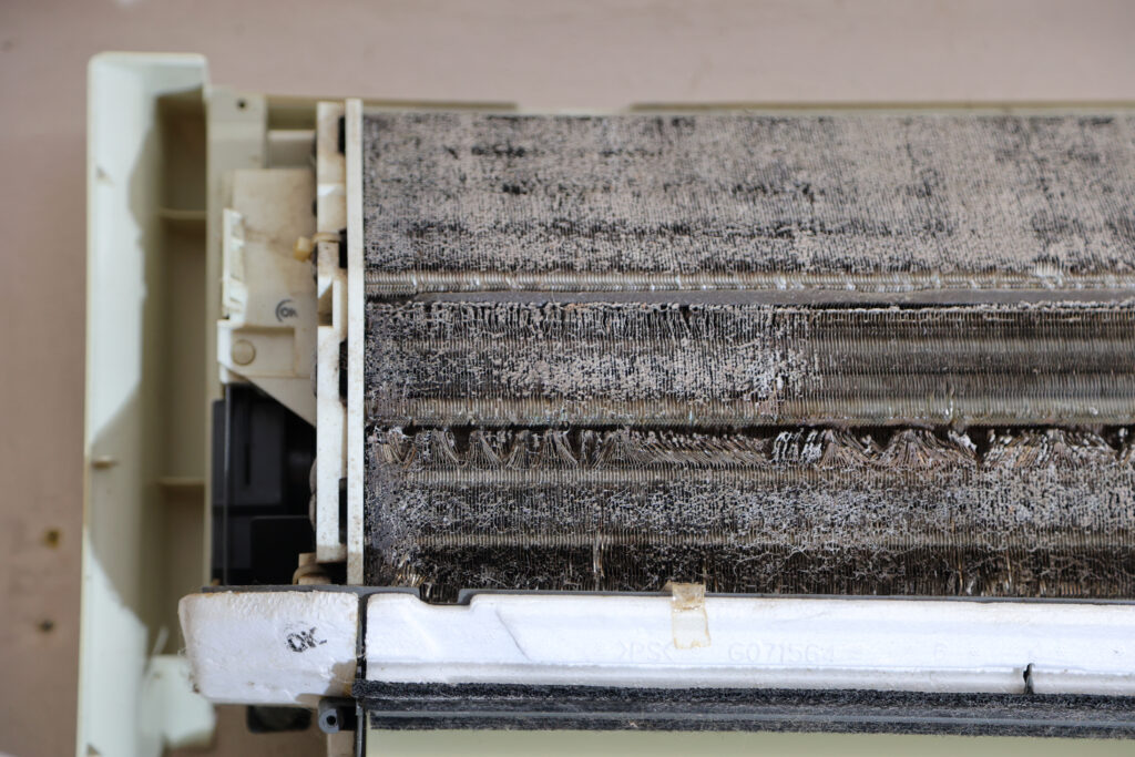 AC smells bad because of dirty evaporator coil
