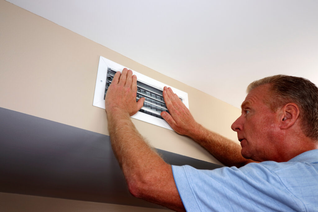 Furnace blowing cold air out of heat vents