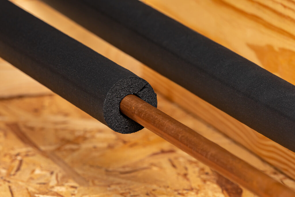 Insulating exposed pipes in preparation for freezing temperatures