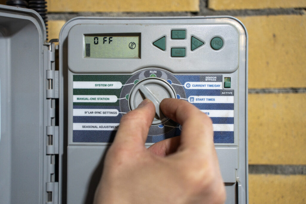 Turing off irrigation system in preparation for freezing temperatures